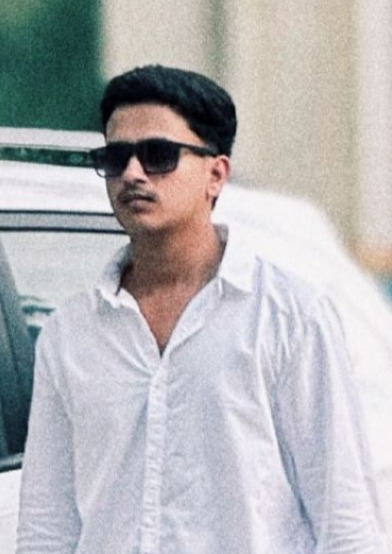 Alfhaz, Customer Support Manager, wearing sunglasses and a white shirt, managing client relationships.